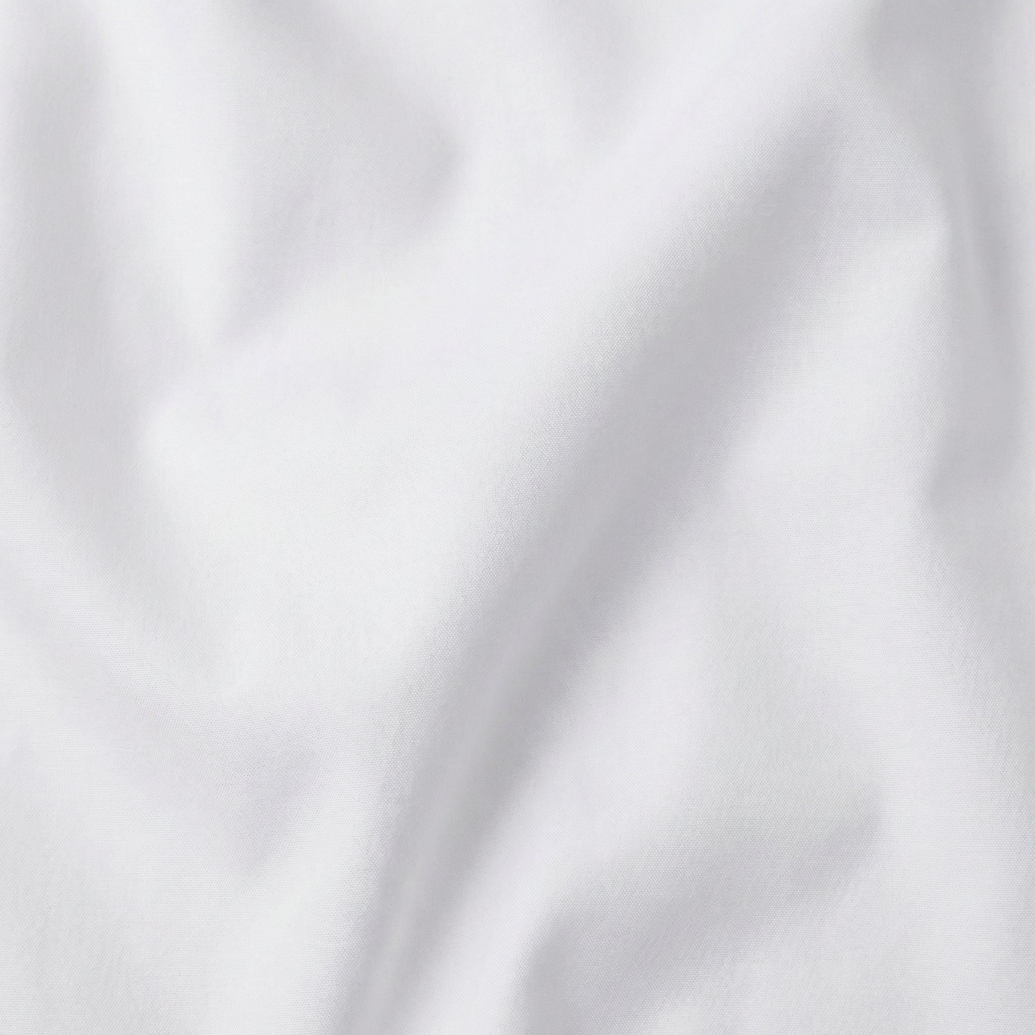 Northfords non-iron dress shirt product flat-lay on dark background